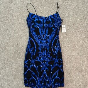 Black and sapphire sequin mini dress XS tag on